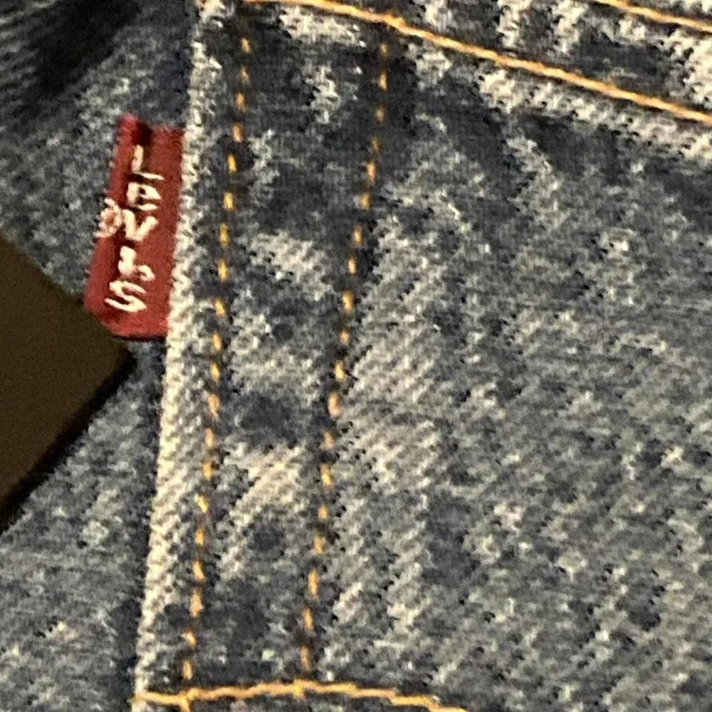 Vintage 00s Levi's 501xx button fly denim‎ paper tag